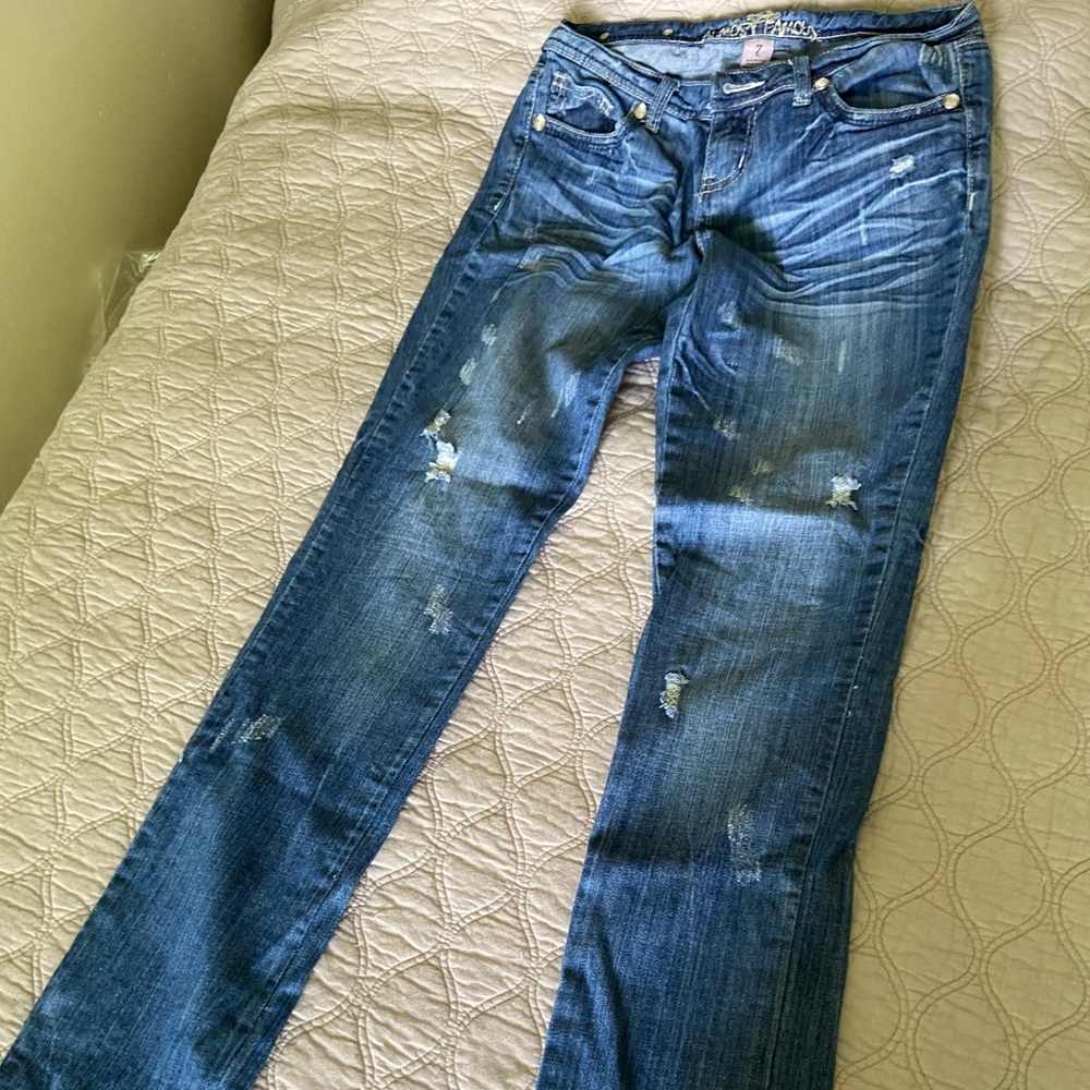 Almost famous distressed jeans size 7